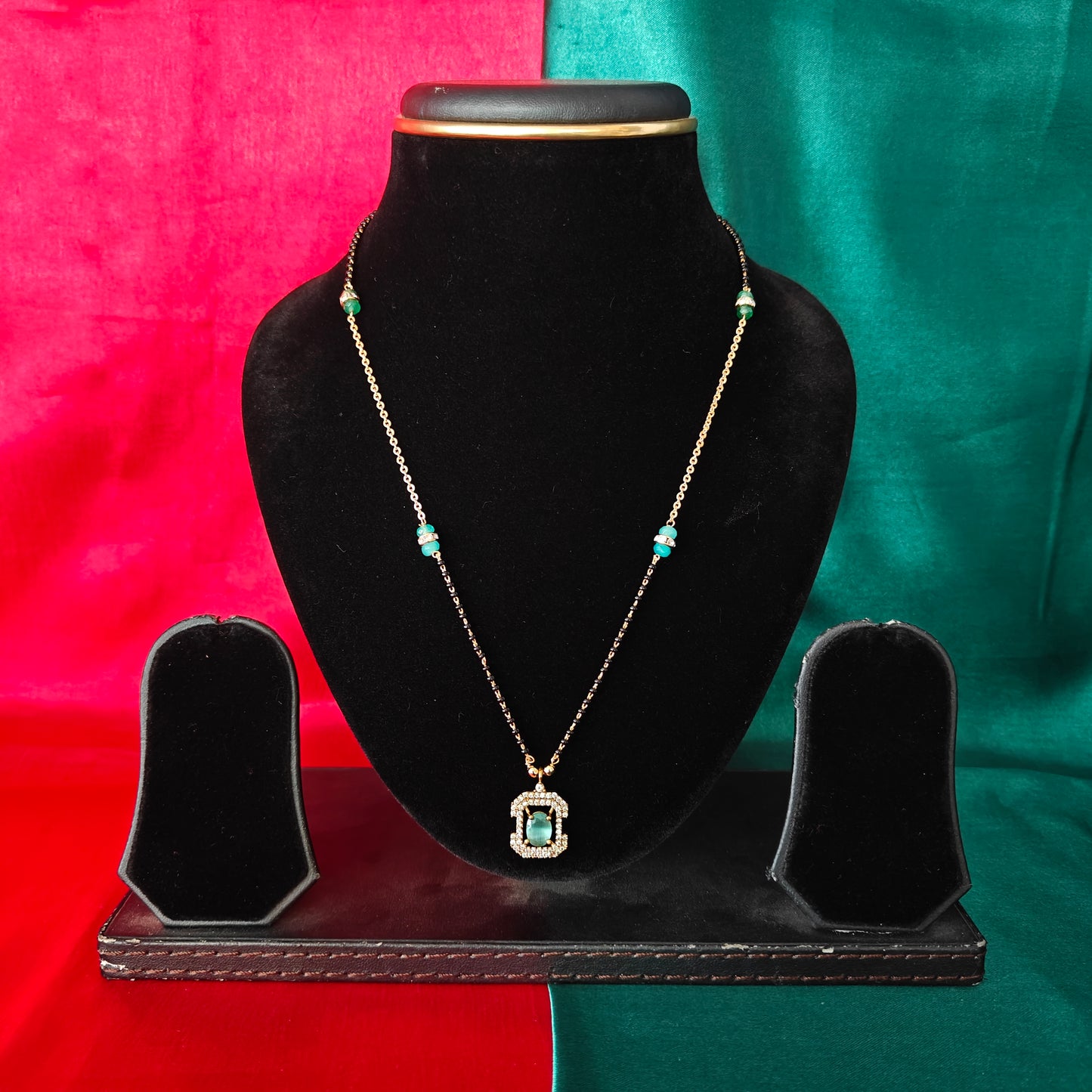 Beautiful Simple Black Beads In Pista Green Stone