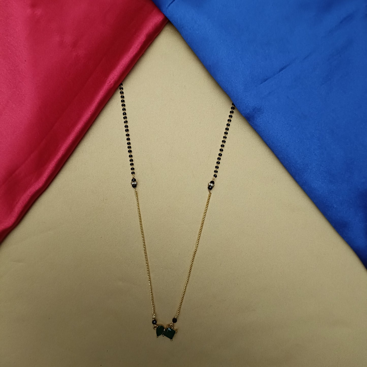Beautiful Black Beads In Green Stone