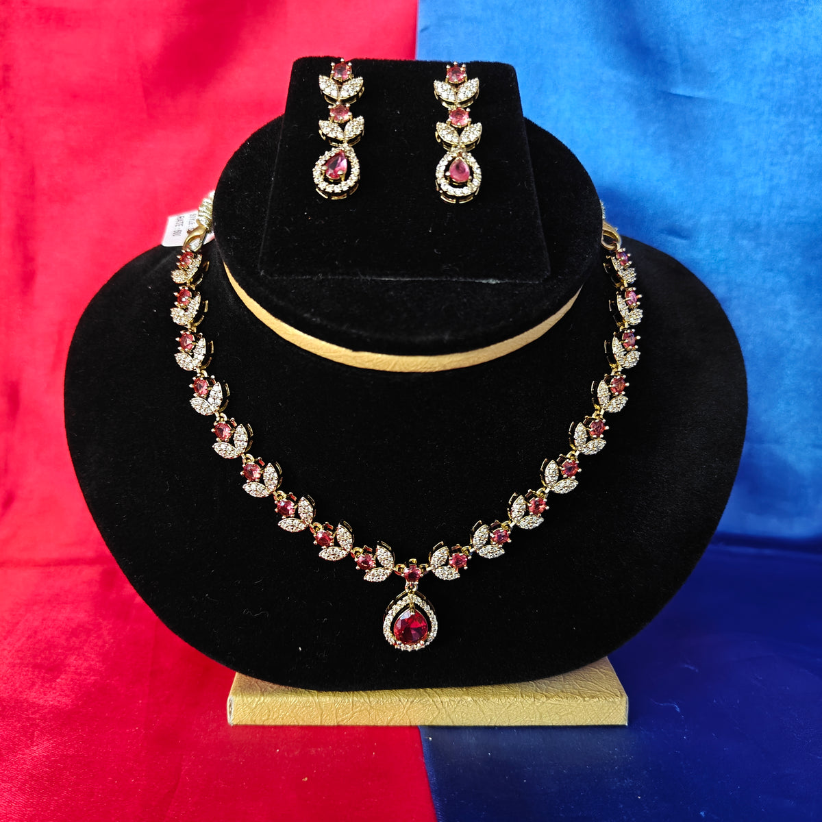 Beautiful Mini Haaram In Maroon Stone