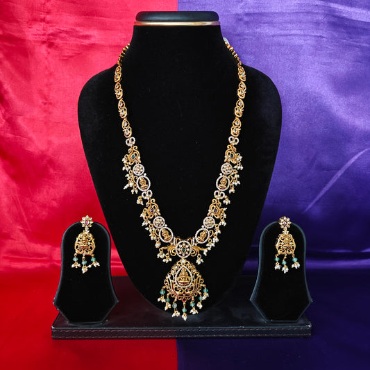 Beautiful Nakshi Long Necklace In Pista Green Crystal With Laxmi Idol