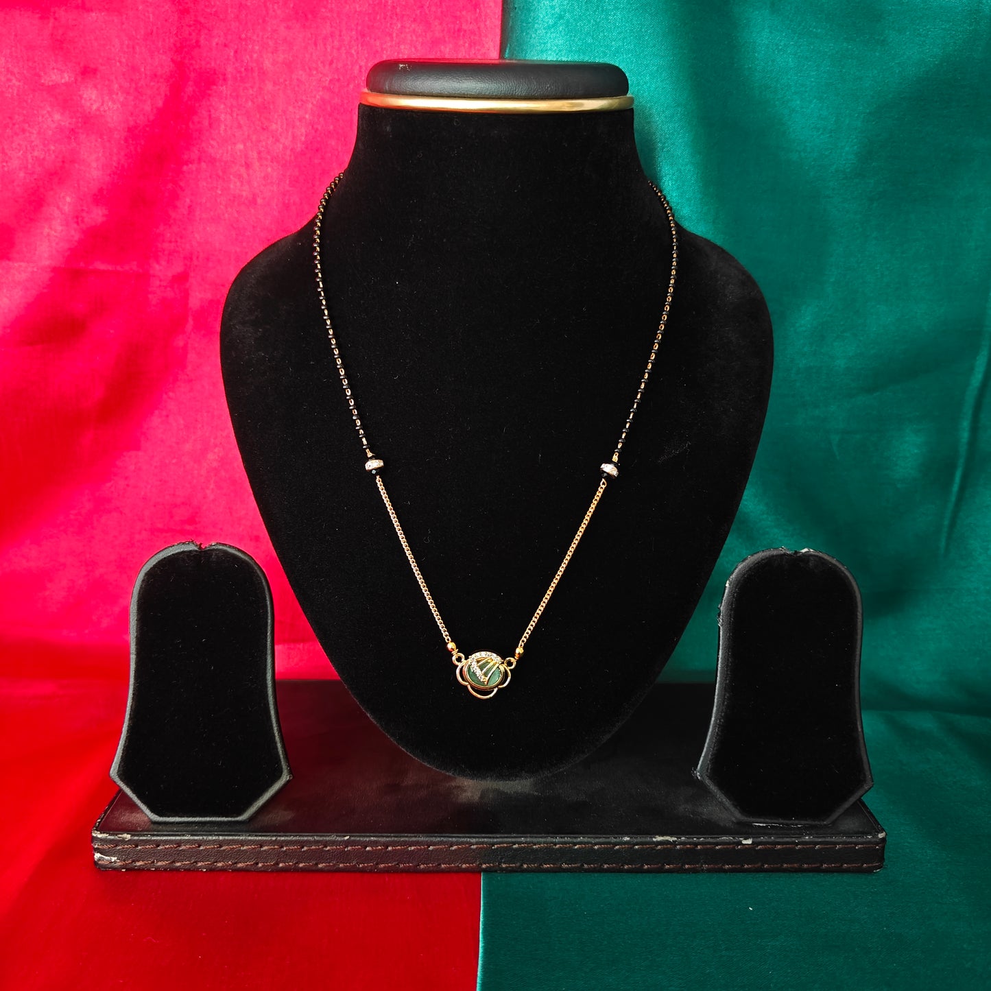 Beautiful Simple Black Beads Short In Pista Green Stone