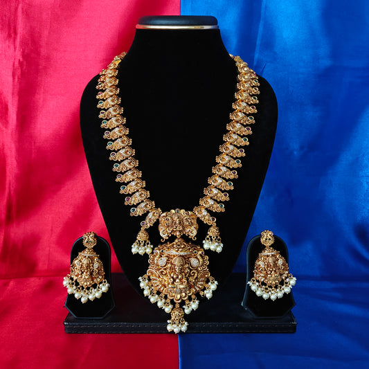 Beautiful Nakshi Long Necklace In Pearls With Laxmi Idol
