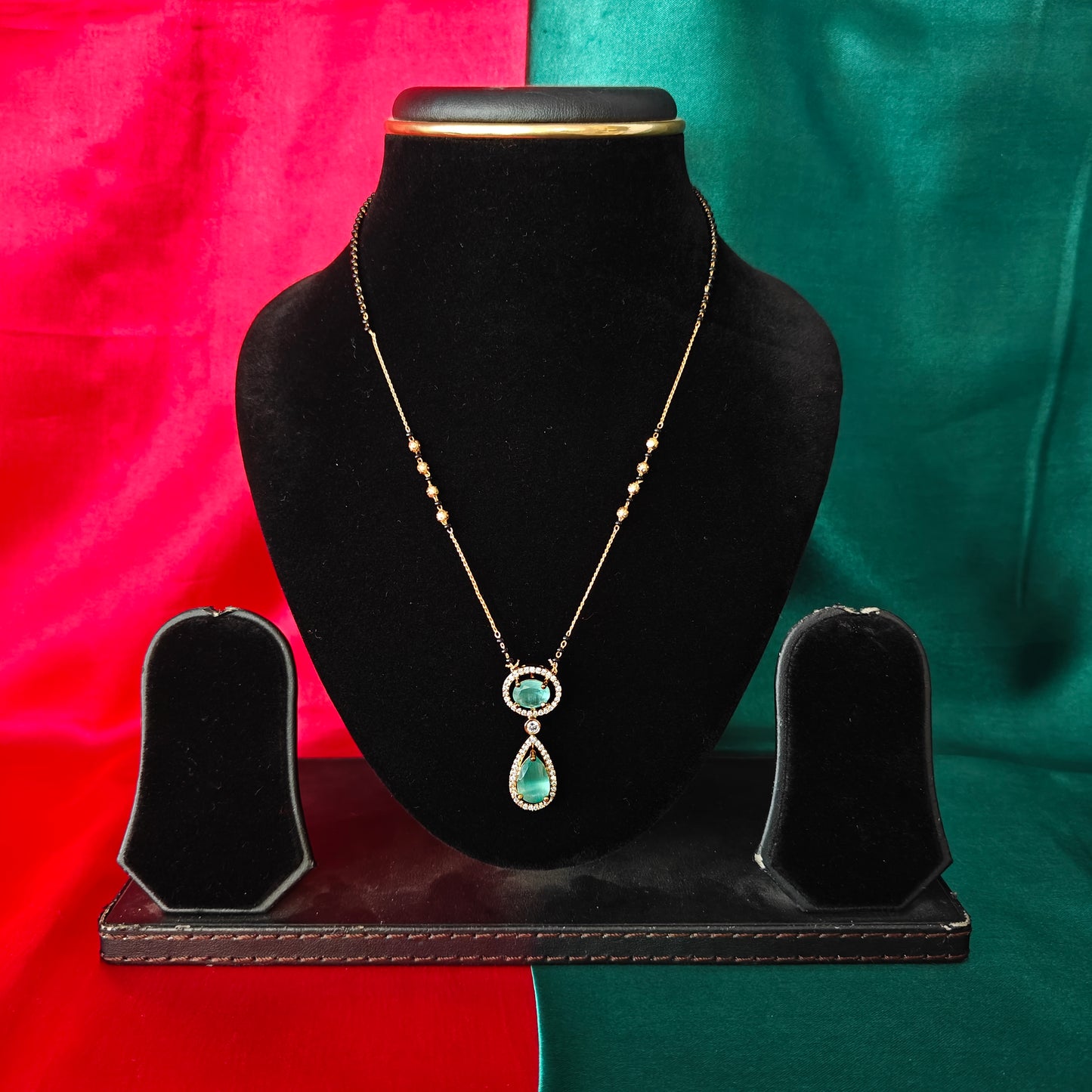 Beautiful Simple Black Beads Short In Pista Green Stone