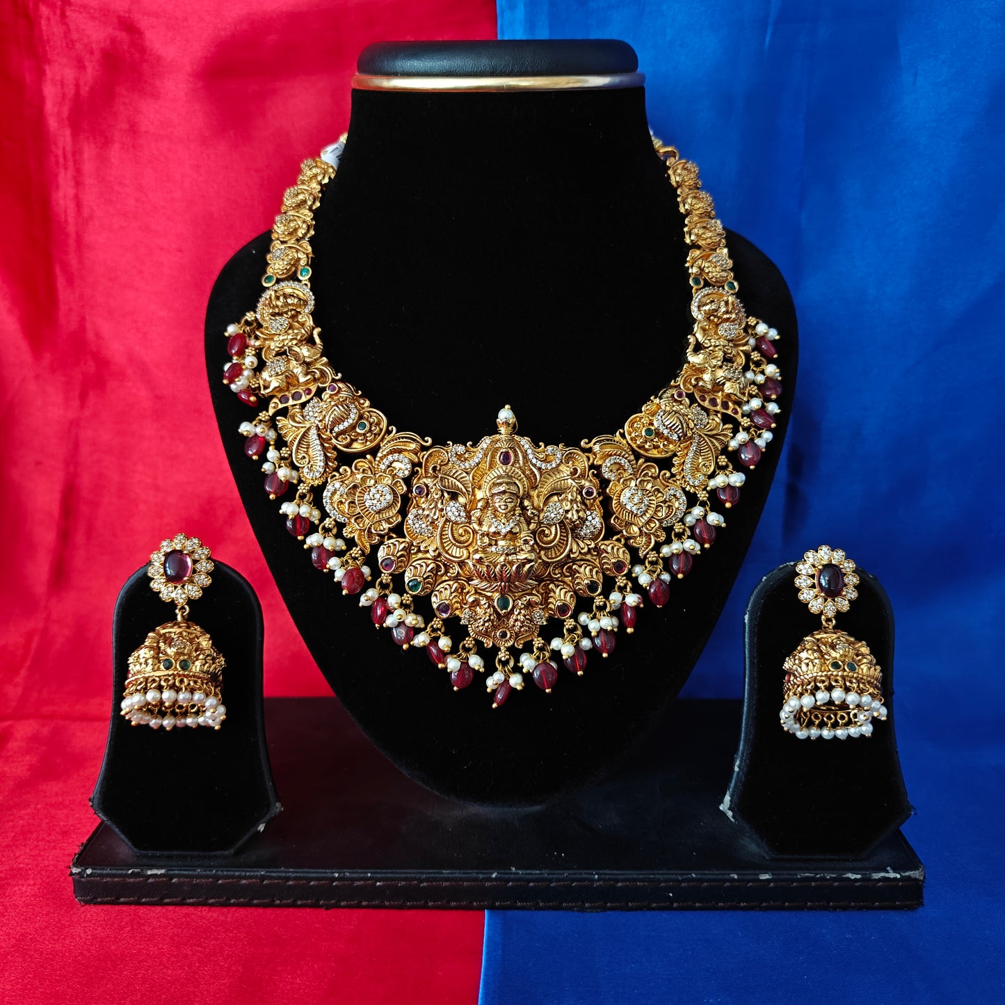 Beautiful Nakshi Short Necklace With Laxmi Idol In Maroon Beads